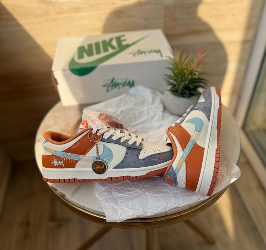 NIKE SB DUNK STUSSY GREY ORANGE
2025